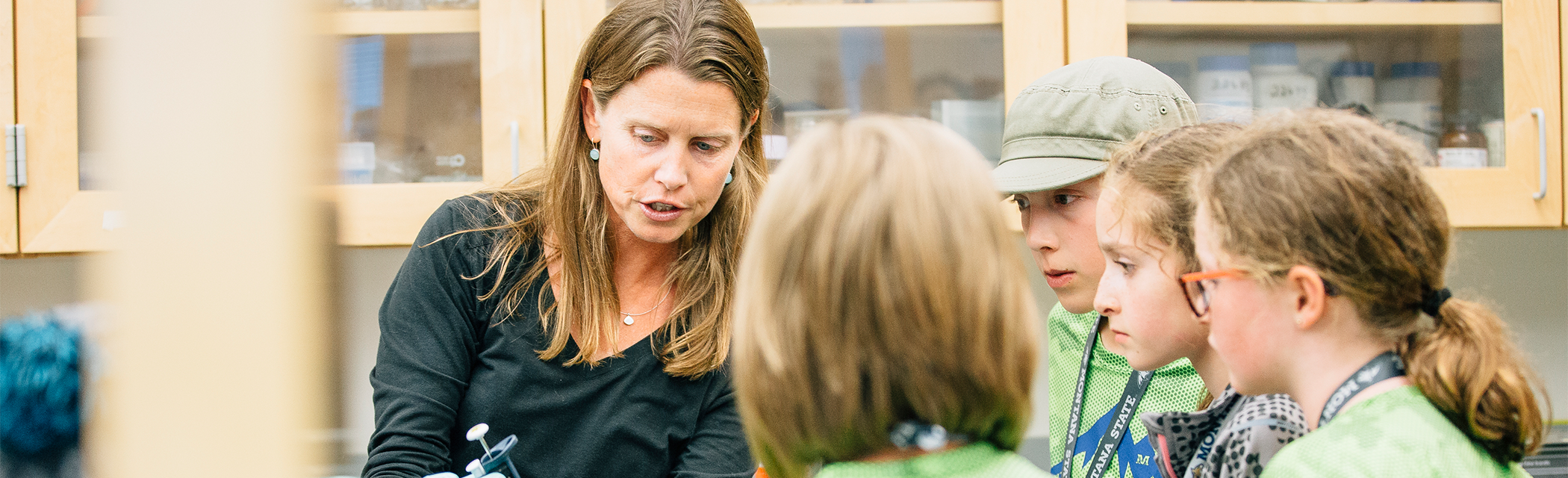 A group of studnets observing a teacher