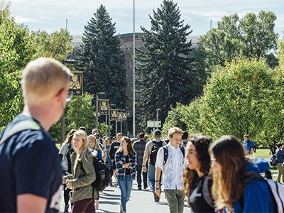 mass of students walking by Romney Hall