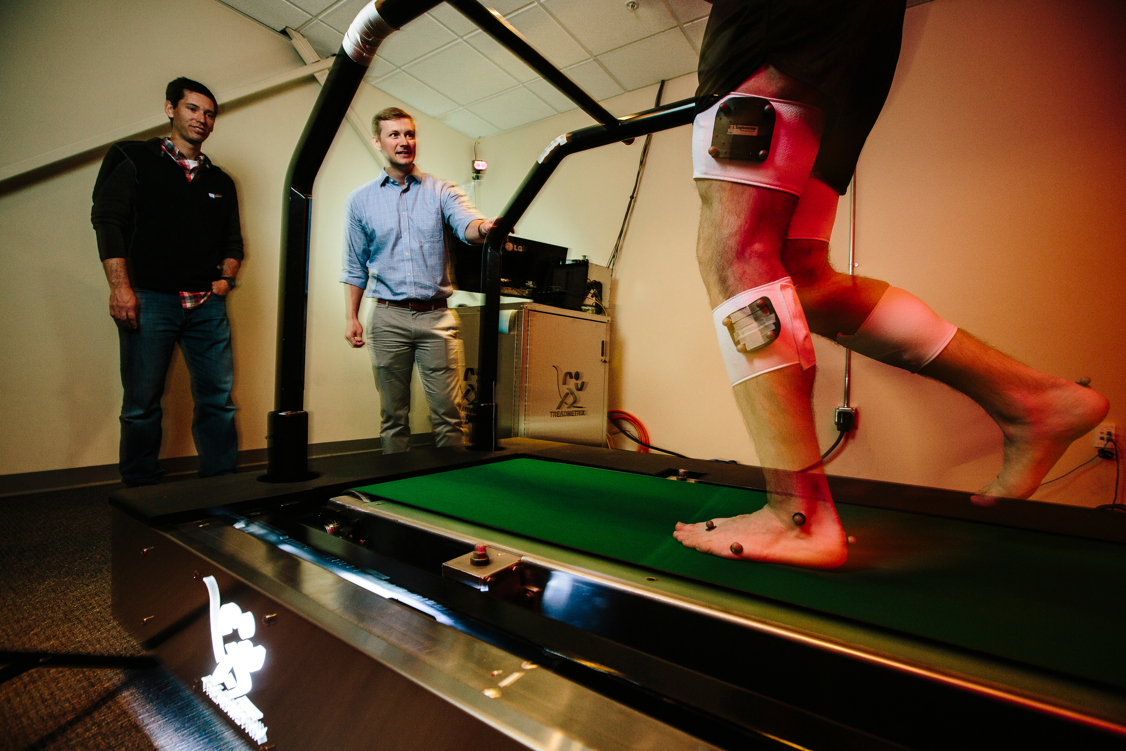 Kinesiology students run tests in a motion analysis lab.