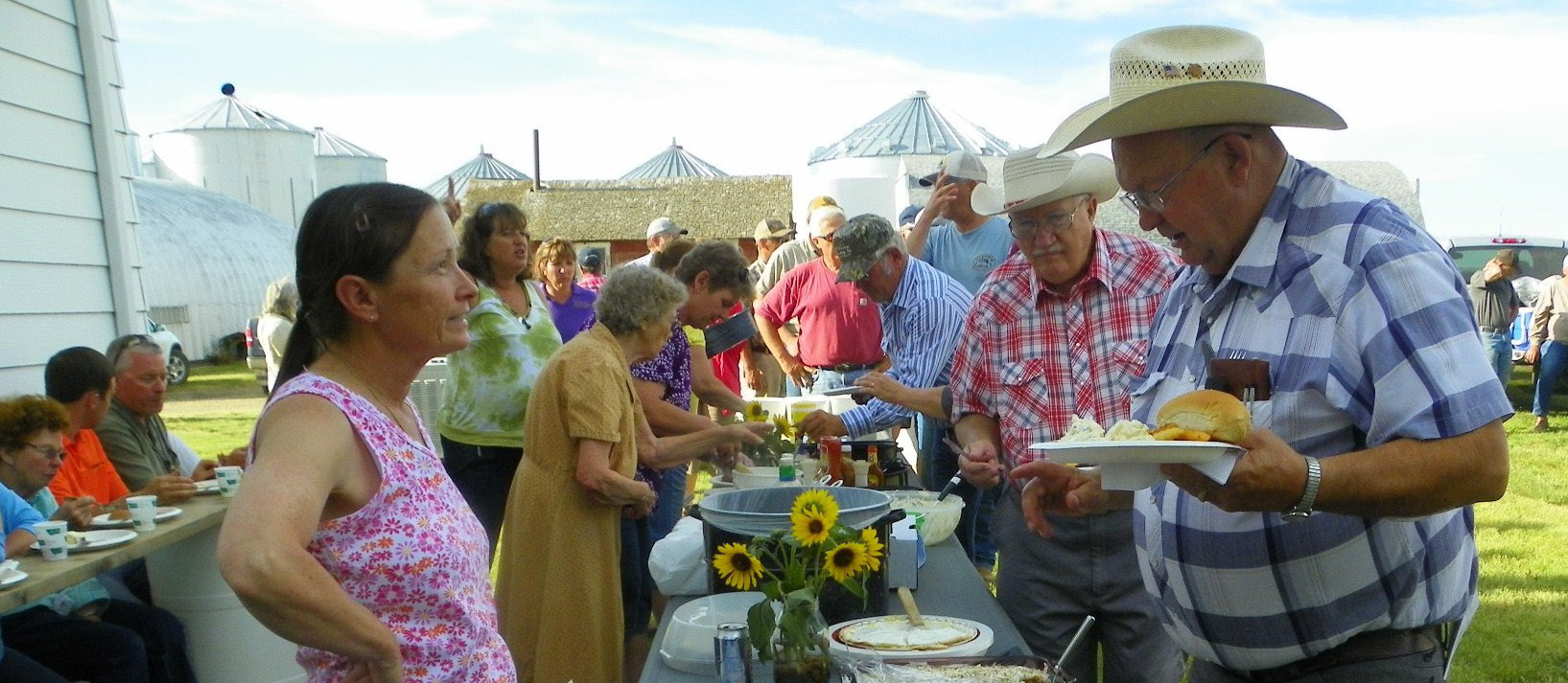 Families having an outdoor picnic