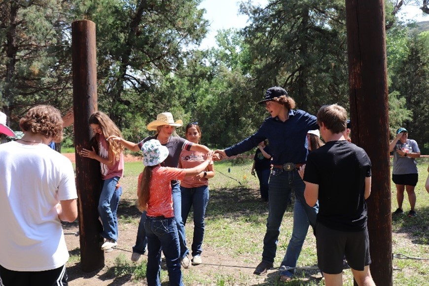  Team trust and communication were key components during an activity at a 4-H OREO activity