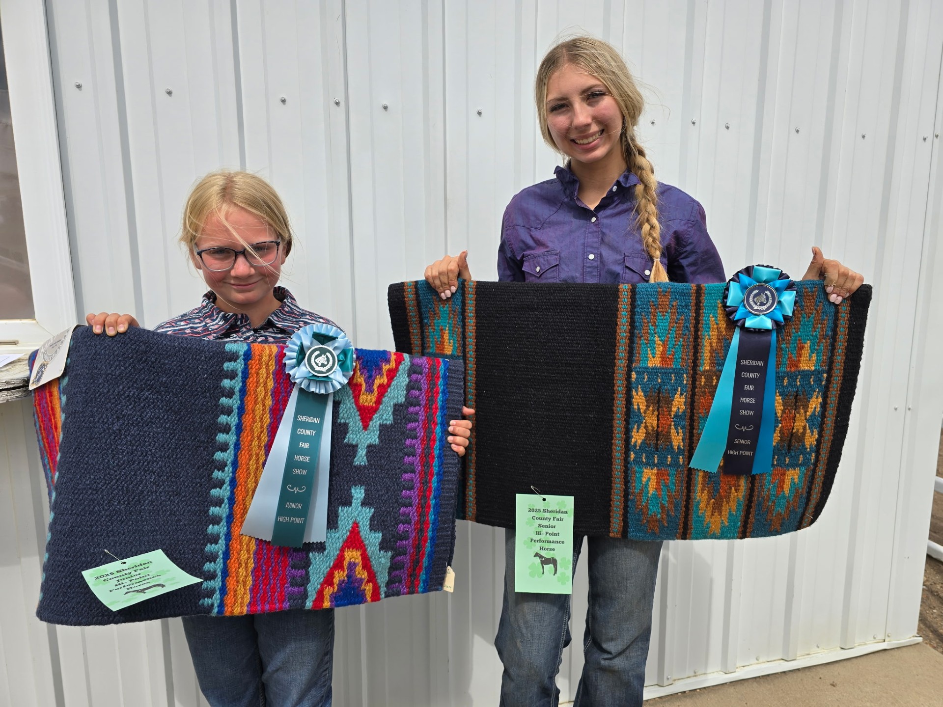 Joriga Shackelford and Sophie Nathe pose with awards for Jr. and Sr. High Point Performance Horse.
