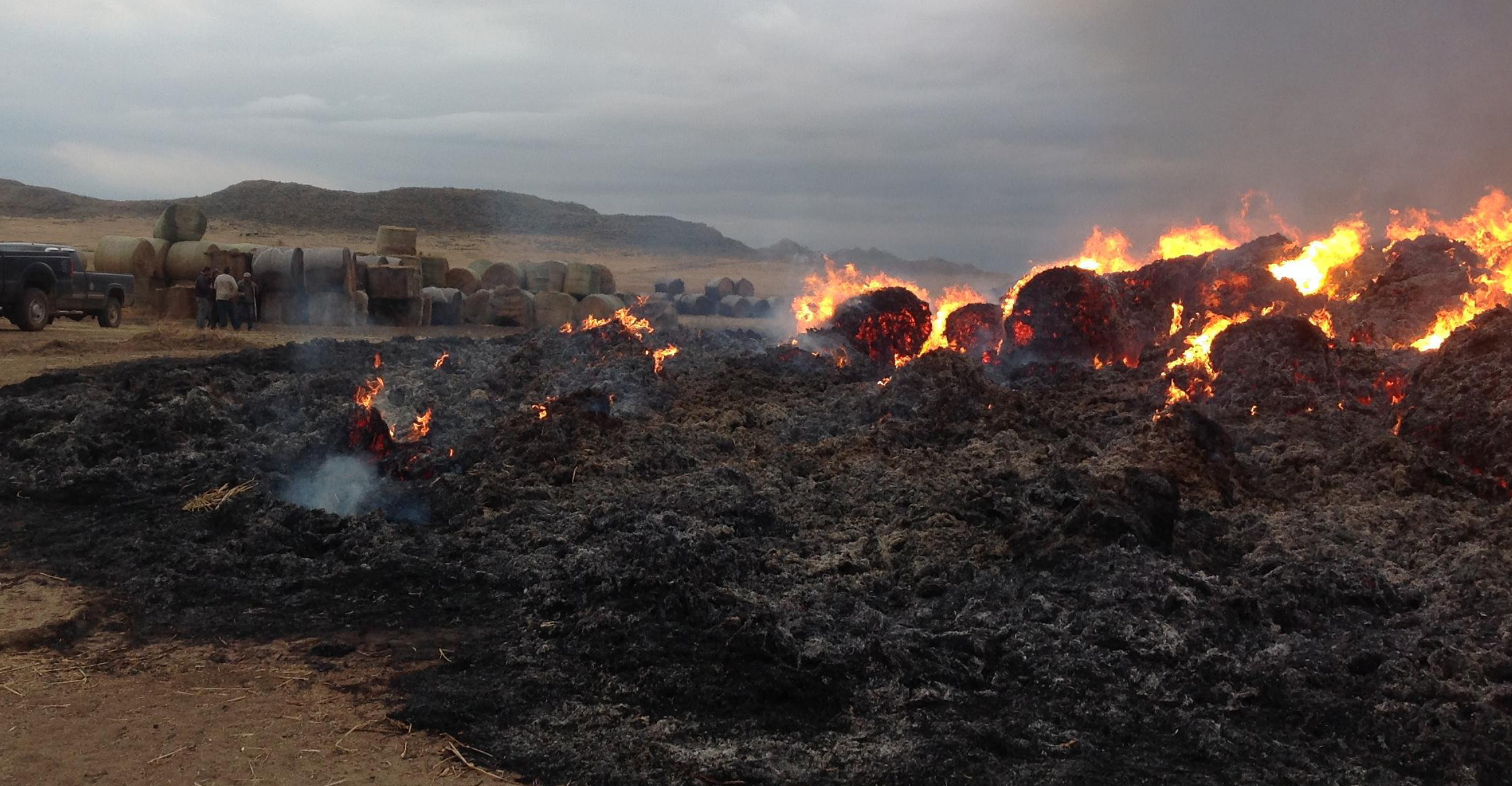 Hay on fire on a ranch.