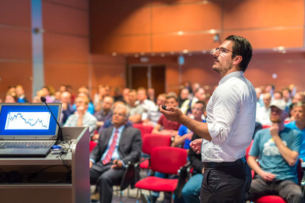 Stock image of a faculty member in front of class