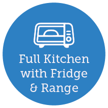 Full kitchen with refrigerator and range&nbsp;
