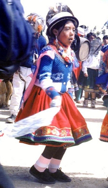 Cañari girl dancing in traditional dress at Ingapirca, Ecuador