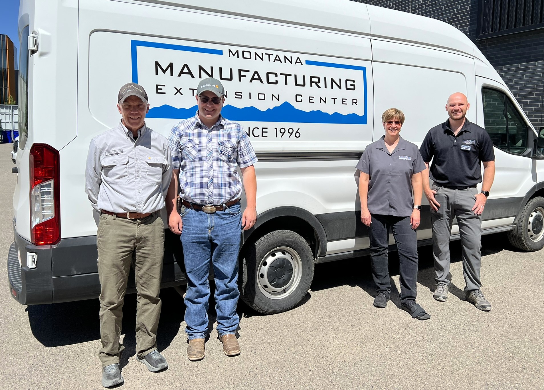 MMEC staff with mobile technology van